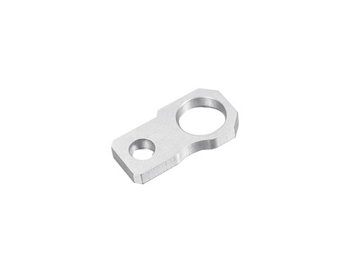 Connector link plate with clean sheared edges and precise hole positioning from fine blanking