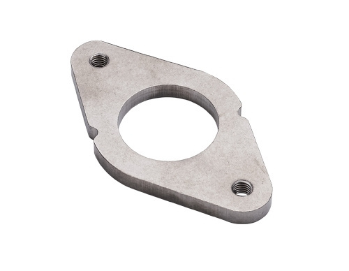 Triangular mounting bracket showing precise hole alignment and flat surface after fine blanking